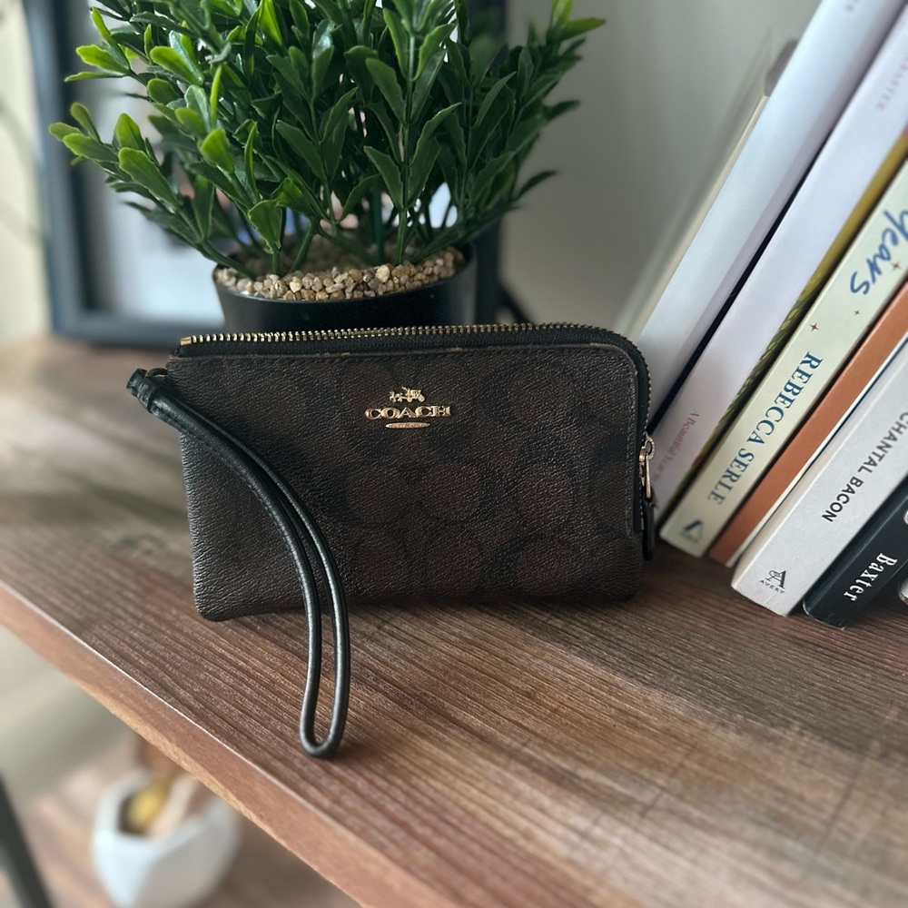 SOLD ON DEPOP Coach Dark Brown Wristlet with Black Strap